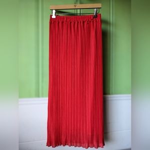 Red pleated maxi skirt